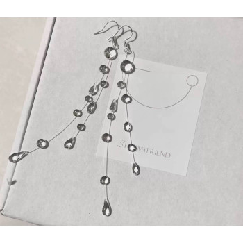 Довгі сережки з прозорими кристалами