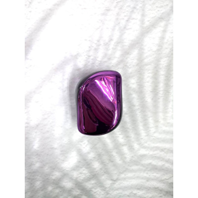 Гребінець у блискучому фіолетовому кольорі