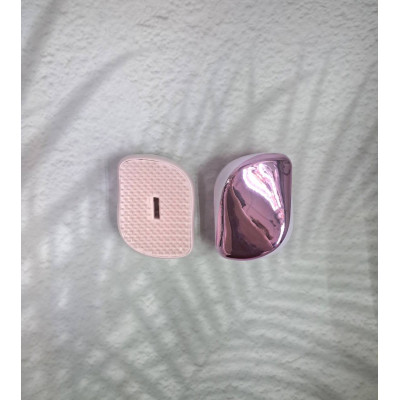 Гребінець у блискучому рожевому кольорі