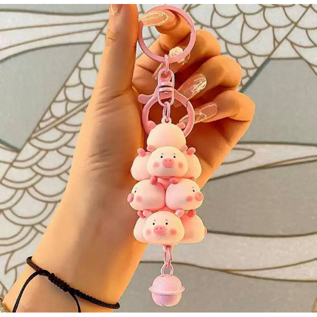 Брелок  Пірамідка з поросят  з дзвіночком — Kawaii аксесуар для сумок та ключів
